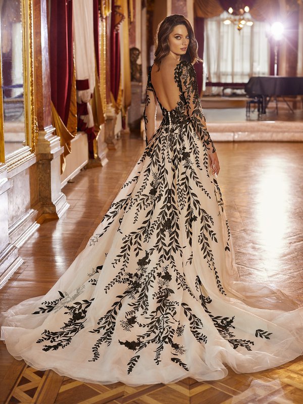 Stunning White Wedding Dress with Black Lace Detailing for a Unique Bridal Look